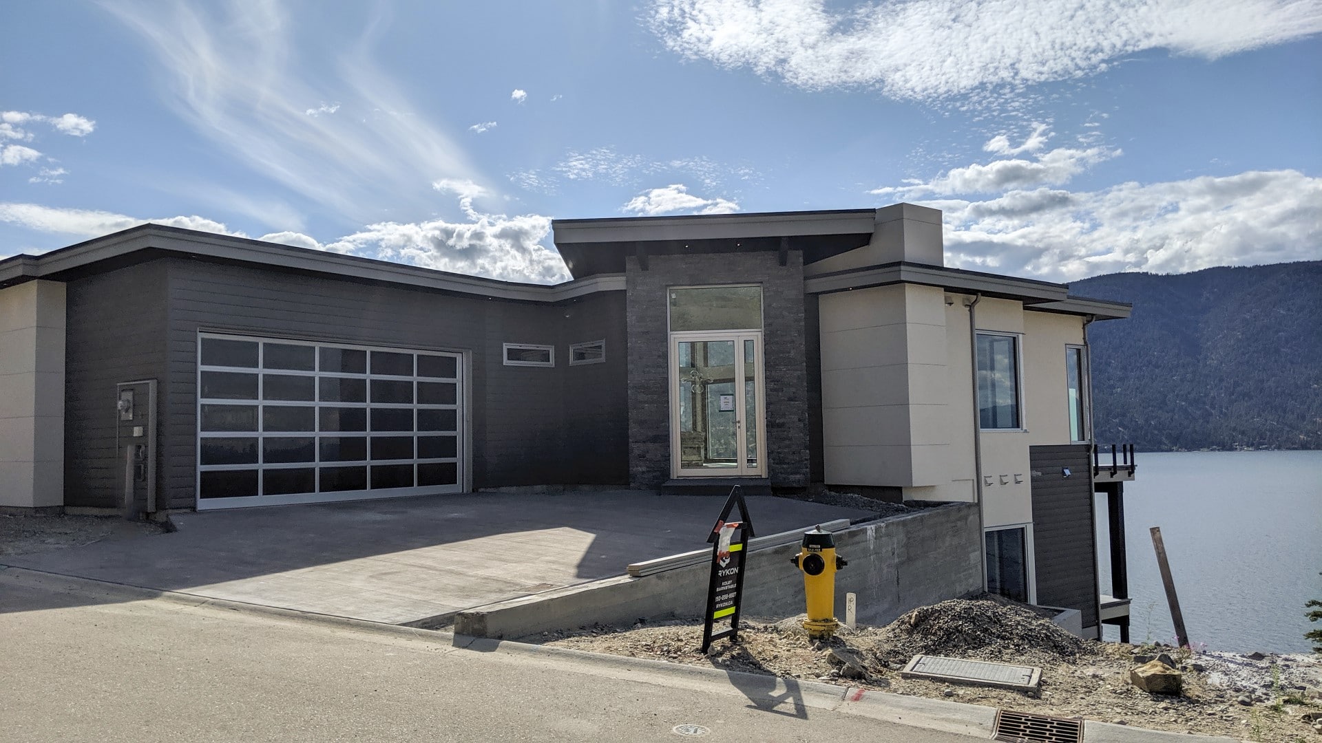 McKinley Beach Lot 68S2, Siding and Driveway, Done